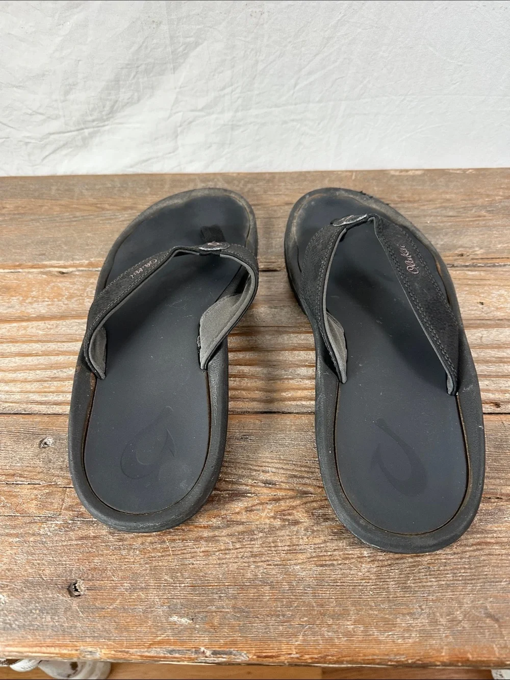 OluKai Men's Black Flip-Flop Sandals